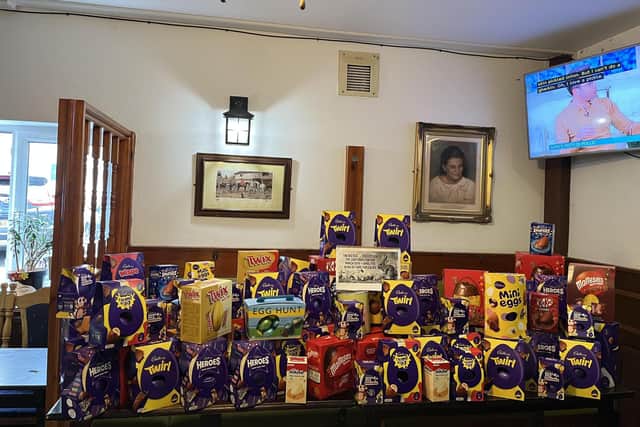 Jeanette Warren and Katy Tracey set up a donation drive at The Lady Hamilton Pub to give Easter eggs to refugees in Surrey.