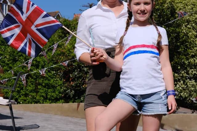 Petula Munro and her daughter, Sophie, 8, celebrate the anniversary of VE Day.
