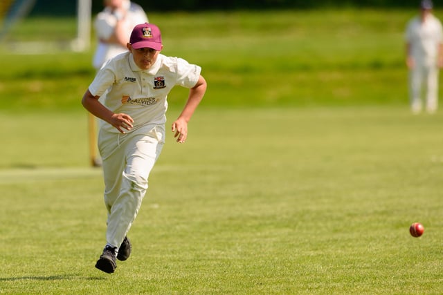 A Fareham & Crofton 3rds fielder chases the ball against Portsmouth Community. Picture: Keith Woodland (270521-150)