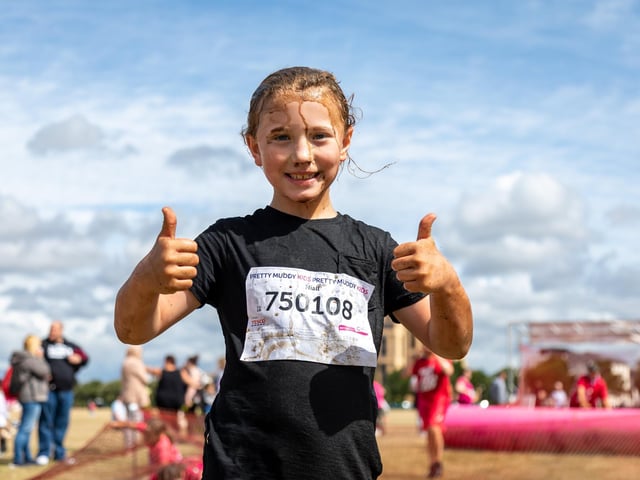 Dirty but happy at the end of the Pretty Muddy kids race