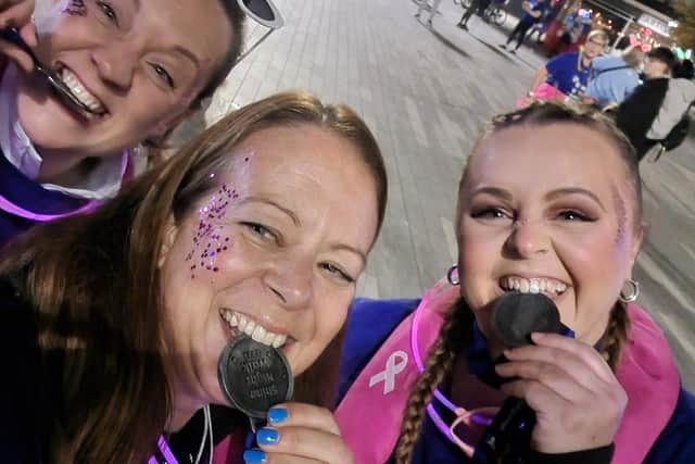 Hannah, Emma, Izzy with their Shin Walk medals on completing the 10km walk