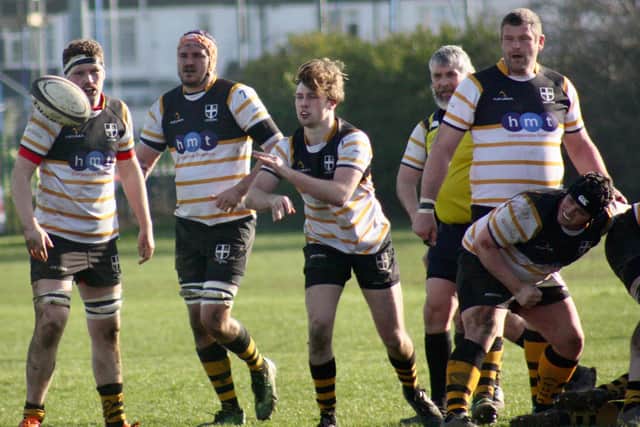 Portsmouth (yellow/black/white) in action during their home loss to Warlingham at Rugby Camp. Picture: Hannah Smith.