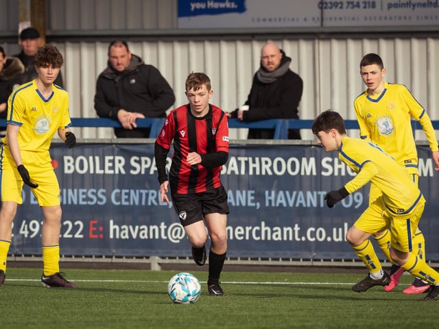 Action from the U16 GEC Marconi Invitation Cup final between Horndean Hawks Condors (red/black) and Pickwick Youth Panthers (yellow). Picture: Keith Woodland (260221-52)