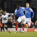 Portsmouth midfielder Jay Mingi is drouth down by Derby County forward Lewis Dobbin during the EFL Sky Bet League 1 match between Portsmouth and Derby County at Fratton Park, Portsmouth, England on 18 November 2022.