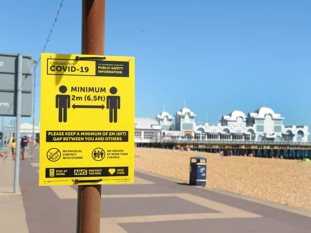 Signs on Southsea promenade reminding people of the need for social distancing. Roads have been closed since March to prevent overcrowding.

Picture: Sarah Standing