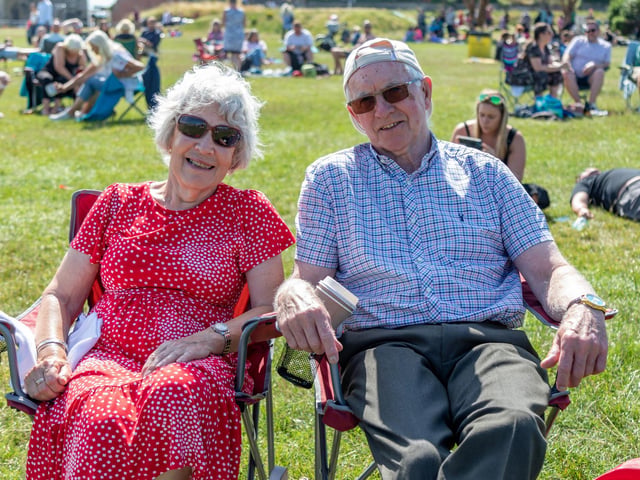 Sue Smith (78) abd Brian Roe (80) enjoying the performance at the Bandstand. Picture: Mike Cooter (210724)