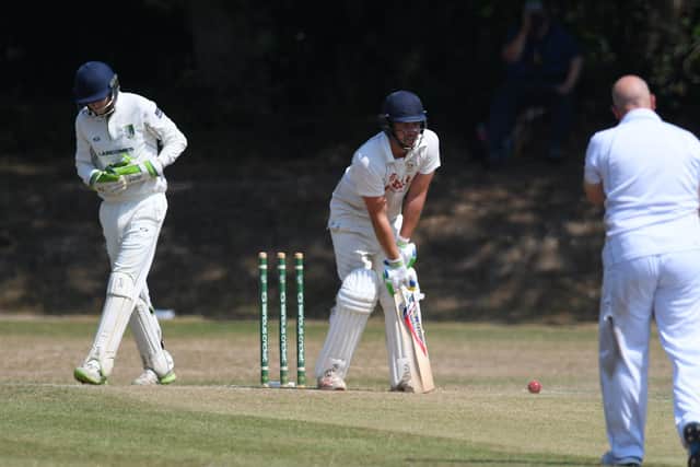Ben Stanbrook is bowled by Sarisbury's Phil Jewell during the Hampshire final of the National Village Cup. Picture: Neil Marshall.