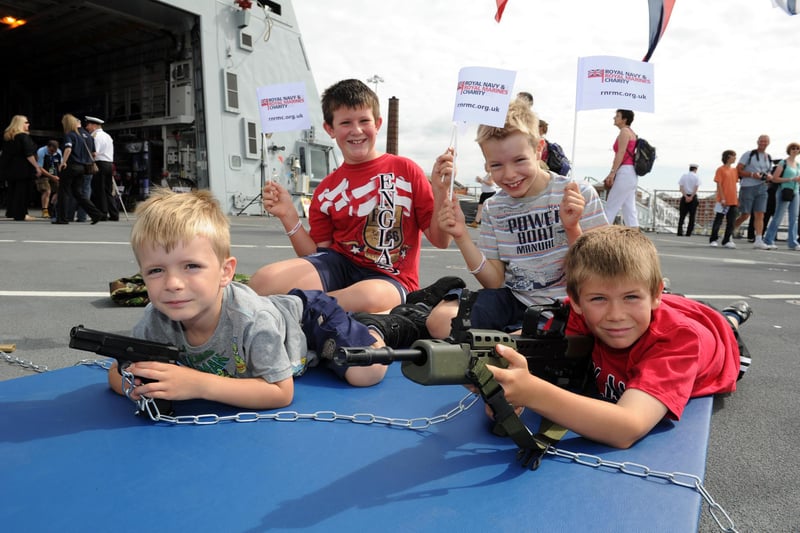 Navy Days 2010 at the Portsmouth Naval Base. Pictured onboard HMS Dauntless are L-R Ethan Hiles 5, Matthew Howells 9, Morgan Hiles 7 and Robert Howells 10 (brothers and cousins) 30th July 2010. Picture: Paul Jacobs 102427-9