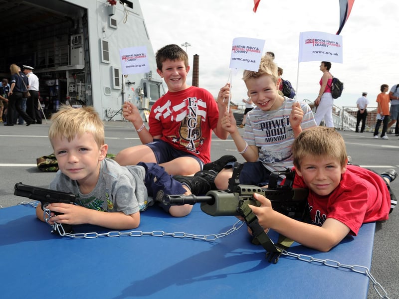 Navy Days 2010 at the Portsmouth Naval Base. Pictured onboard HMS Dauntless are L-R Ethan Hiles 5, Matthew Howells 9, Morgan Hiles 7 and Robert Howells 10 (brothers and cousins) 30th July 2010. Picture: Paul Jacobs 102427-9