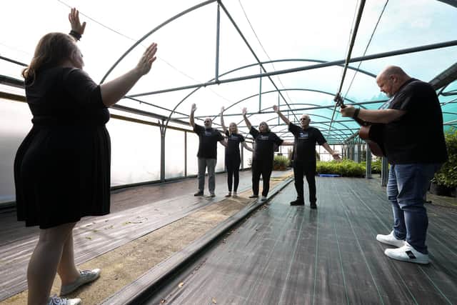 Dielle Hannah, left, performs with the Igloo Choir at Mount Folly Nurseries, Wickham. The choir are having a taster day on August 21st where all are welcomePicture: Chris Moorhouse (jpns 120821-30)
