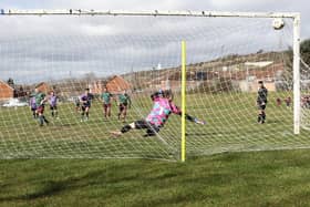 Cross Keys Athletic score from the penalty spot during their 8-0 win over Al's Bar. Picture: Kevin Shipp