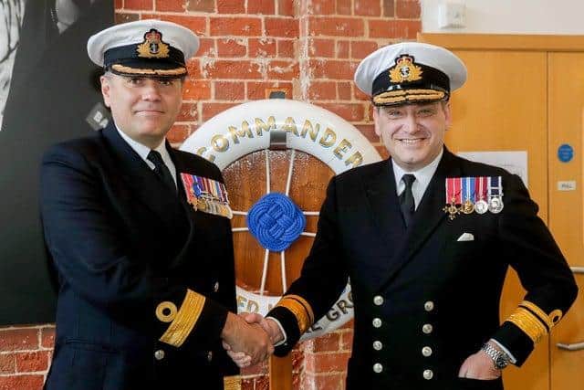 Commodore Steve Moorhouse, left, is now the new commander of the UK's carrier strike group. He is pictured with Rear Admiral Mike Utley, who has been promoted to commander UK strike force. Photo: Royal Navy