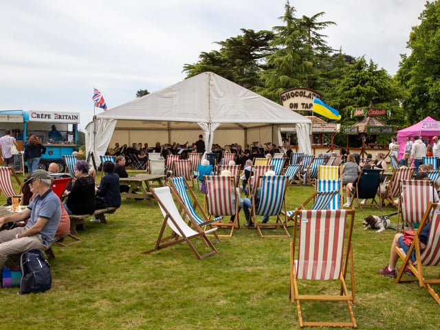 Stansted Park opened its doors for its Summer Festival this weekend, with re-enactments, vintage vehicles, archery, horse displays and lots of fun for the family.Pictured - Visitors enjoying the Emsworth Concert BandPhotos by Alex Shute