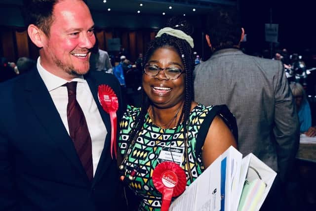 Yinka Adeniran, right, celebrates with Stephen Morgan MP. Picture: Chris Moorhouse