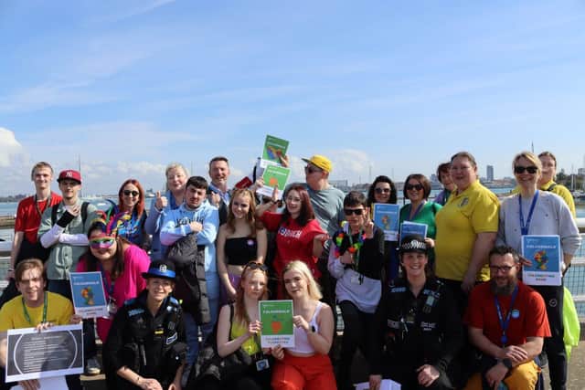 Students and staff taking part in the colour walk
