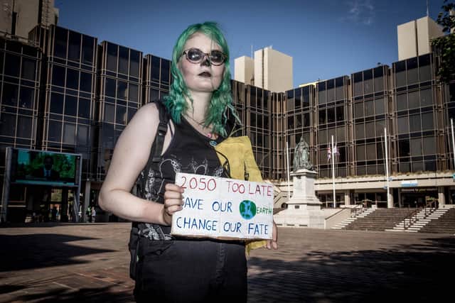 Portsmouth Extinction Rebellion have marched to the civic offices to present a letter to Stephen Morgan and Penny Mordaunt asking them to put pressure on the government about climate change action on 25 June 2020.

Pictured: Selma Heimedinger outside Portsmouth Guildhall.

Picture: Habibur Rahman