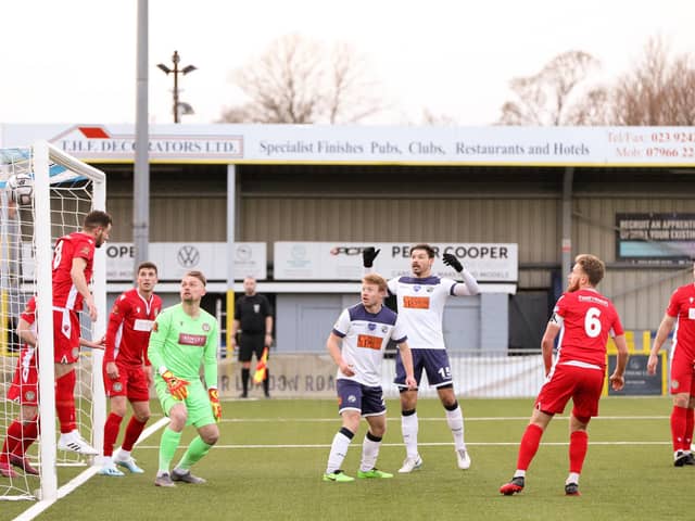 Sam Magri, far right, heads Havant and Waterlooville into a 2-0 lead against Hungerford Town. Picture: Chris Moorhouse