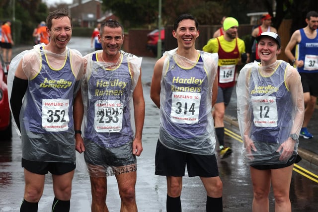 Hardley Runners with their ponchos ahead of the Hayling 10. Picture: Sam Stephenson.