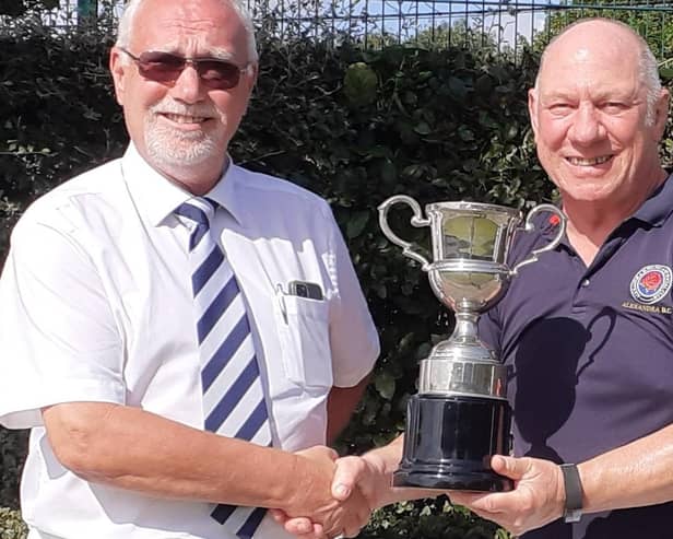 Champion of Champions winner Jamie Cooke with Simon Batcheler, the acting P&D competition secretary.