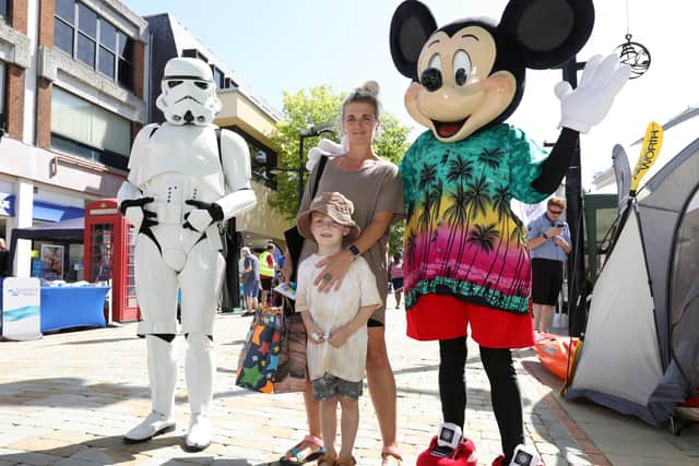 Lisa Sayers and her son, Beau, 5, with a Stormtrooper and Minnie Mouse
Picture: Chris Moorhouse (jpns 170721-02)