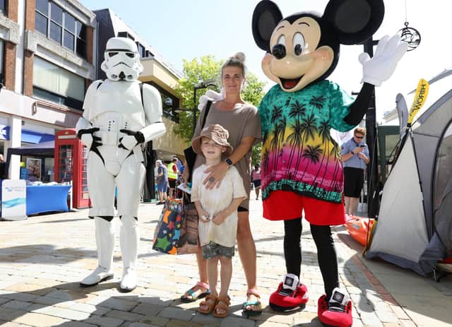 Lisa Sayers and her son, Beau, 5, with a Stormtrooper and Minnie Mouse
Picture: Chris Moorhouse (jpns 170721-02)