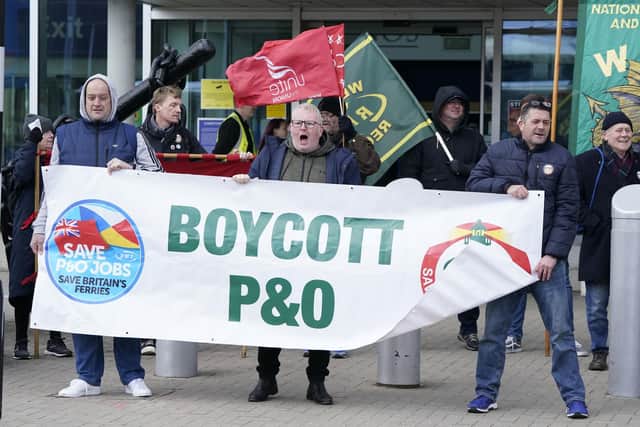 People take part in a demonstration at the Portsmouth International Port after P&O Ferries sacked 800 seafarers without notice on March 17, amid plans to bring in cheaper agency staff. Picture: Andrew Matthews/PA Wire