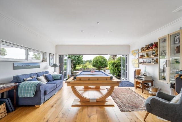 The stunning interior overlooks some impressive garden views