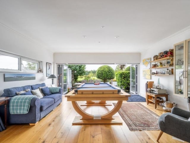 The stunning interior overlooks some impressive garden views