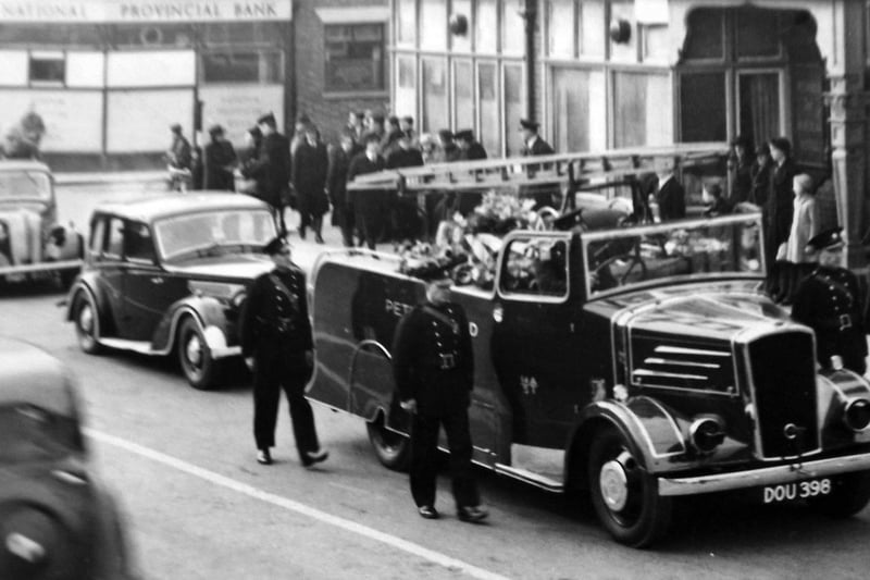 The funeral of a fireman in Waterlooville. The fire appliance seems to have come from Petersfield.