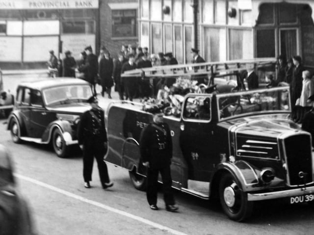 The funeral of a fireman in Waterlooville. The fire appliance seems to have come from Petersfield.