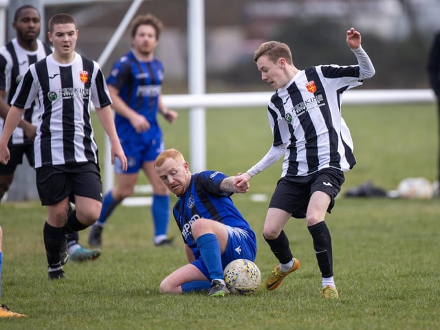 Hayling United (black/white) v Clanfield. Picture by Alex Shute