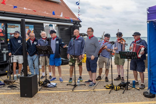 The Selsey Shantymen performing during the open day at Langstone Harbour. The RNLI welcomed the public to showcase what they do on a day to day basis. Picture: Mike Cooter (310824)