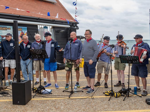 The Selsey Shantymen performing during the open day at Langstone Harbour. The RNLI welcomed the public to showcase what they do on a day to day basis. Picture: Mike Cooter (310824)