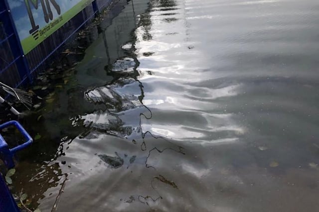 The flooded football ground.