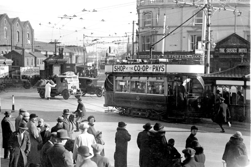 Some of you said you would like to have the city's tram or trolleybus network back in place. Here's one of the vehicles in Guildhall Square, Portsmouth, in 1935.