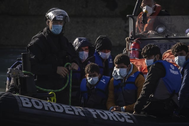 Migrants are brought into Dover docks by Border Force staff on September 9, 2021 in Dover, England (Photo by Dan Kitwood/Getty Images)