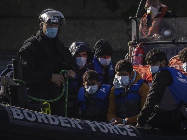 Migrants are brought into Dover docks by Border Force staff on September 9, 2021 in Dover, England (Photo by Dan Kitwood/Getty Images)