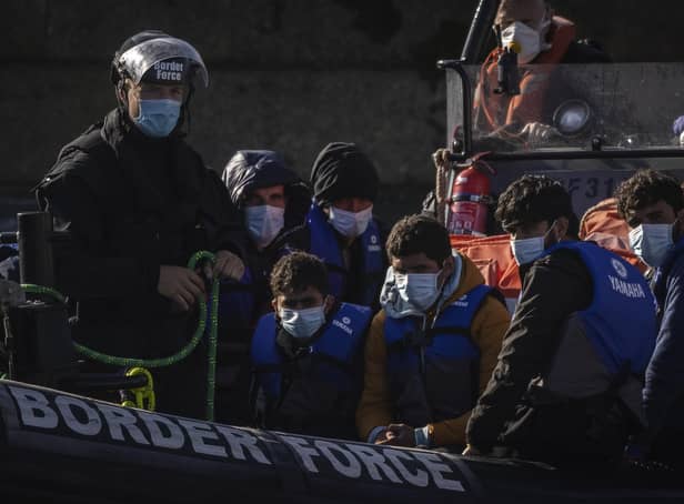 Migrants are brought into Dover docks by Border Force staff on September 9, 2021 in Dover, England (Photo by Dan Kitwood/Getty Images)