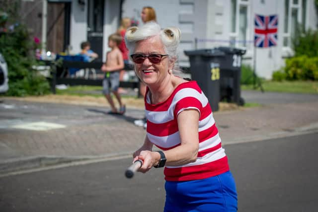 Denise Barlow with her two-metre social distance stick.

Picture: Habibur Rahman