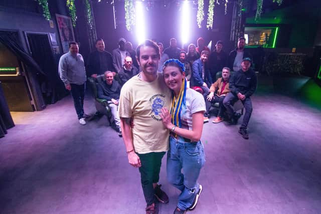 Rave for Ukraine announcement at Moonshine Club, Southsea on Wednesday 23rd March 2022Pictured: Organisers Kriss Baird and Olga Kravchenko with Local DJs, performers and artists at the Moonshine ClubPicture: Habibur Rahman