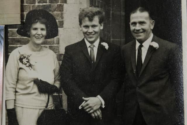 Dorothy with her late son John and husband Alfred.