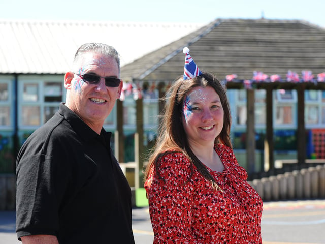 Doug Richards, site manager for Meon Junior School and Sara Paine, headteacher of Meon Junior School and executive headteacher of Meon Infant School celebrating The Queen's Platinum Jubilee