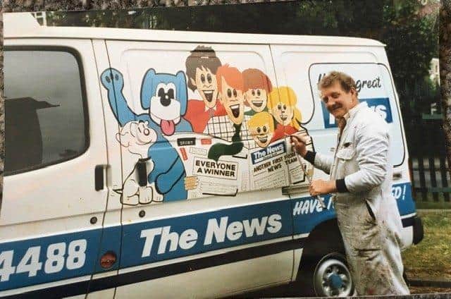 Vernon Fletcher decorating on of The News' vans. Picture: Supplied
