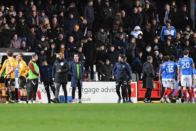Play was stopped during the second half as medics attended to an emergency incident in the home end after a fan fell ill.  Picture: Dennis Goodwin.
