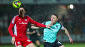 Colby Bishop battles with Accrington's Doug Tharme in Pompey's Crown Ground encounter. Picture: Simon Davies/ProSportsImages