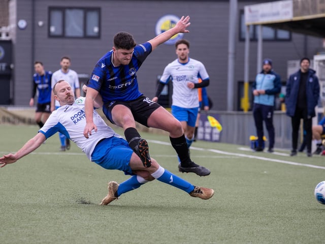 An Andover New Street Swifts player makes a tackle. Picture by Alex Shute