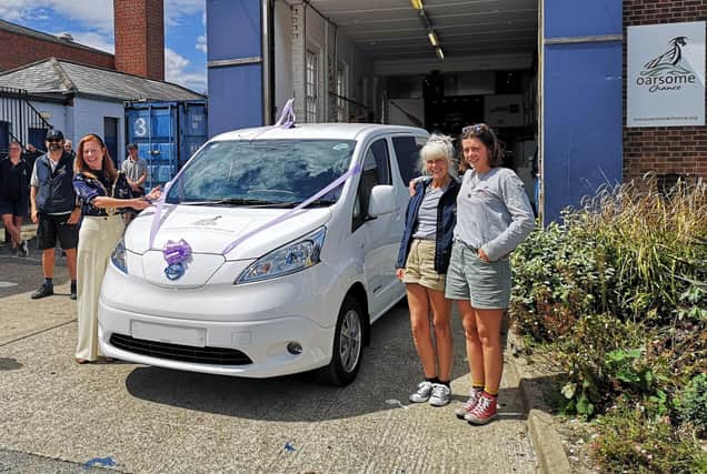 The Mayor of Gosport, Councillor Zoe Huggins (left), unveils Oarsome Chance's new electric minivan.