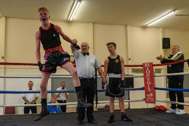Waterlooville Boxing Club's Monty Bray jumps for joy at winning his bout against Ivor Price. Picture: Vernon Nash