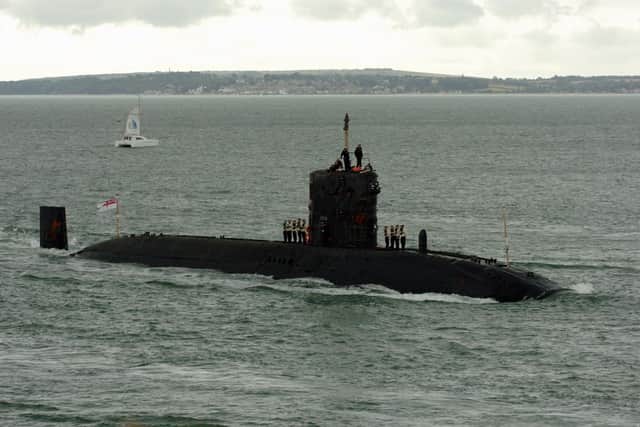 Nuclear submarine HMS Trafalgar enters Portsmouth Harbour in 2006

PICTURE:JONATHAN BRADY     063649-287