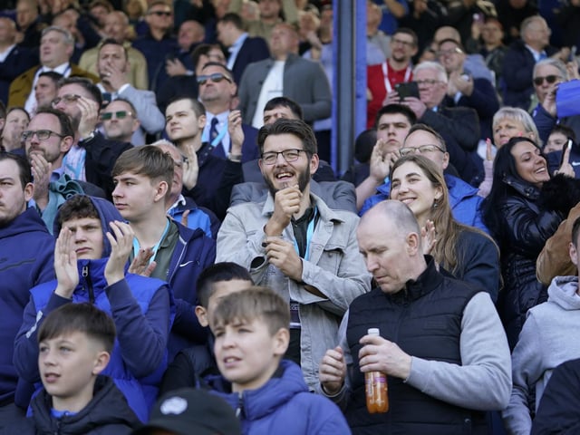 Pompey fans applauding the teams as they enter the pitch.